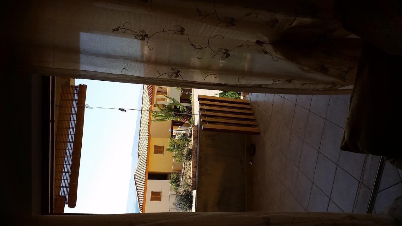 Verande Tanca Torre Isola Rossa Kültér fotó